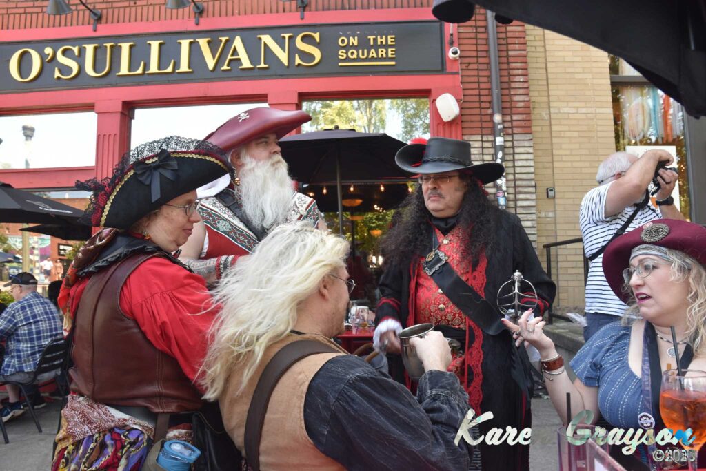 Pirates outside of O'Sulllivan's Irish Pub in Decatur. PiratePalooza 19. Photo by Karen Grayson, copyright 2023